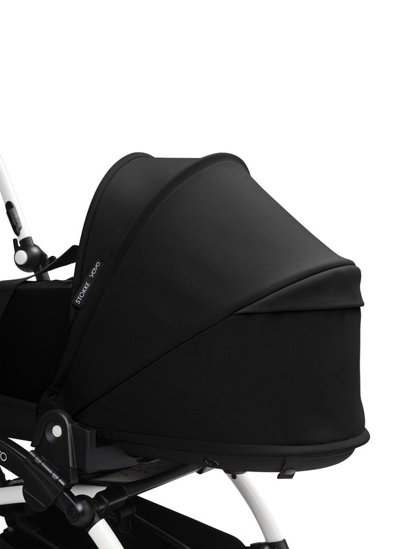 Alcofa STOKKE YOYO³ ultra leve e compacta, com colchão respirável, capota ventilada, cobre-pés, tecido impermeável com proteção UPF 50+ e compatível com o carrinho STOKKE YOYO³ para bebés desde o nascimento até aos 9 kg. Black
