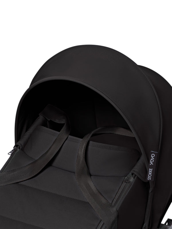 Alcofa STOKKE YOYO³ ultra leve e compacta, com colchão respirável, capota ventilada, cobre-pés, tecido impermeável com proteção UPF 50+ e compatível com o carrinho STOKKE YOYO³ para bebés desde o nascimento até aos 9 kg. Black