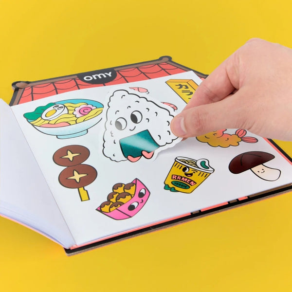 Boutique para Colorir OMY com 34 páginas, capa holográfica e autocolantes
Sushi Shop