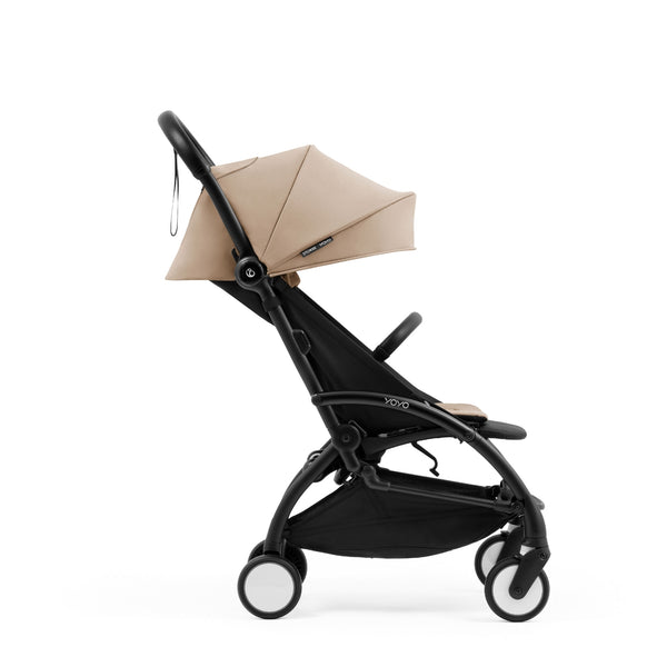Carrinho Stokke® YOYO⁵ leve e ultracompacto com dobragem a uma mão e suspensão nas 4 rodas
Taupe