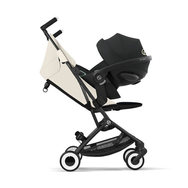 CYBEX LIBELLE SILVER, carrinho de bebé ultracompacto de 6 kg, compatível com bagagem de mão, preparado para Travel System, com arnês ajustável de um puxão e utilização desde o nascimento até aos 22 kg. Canvas White