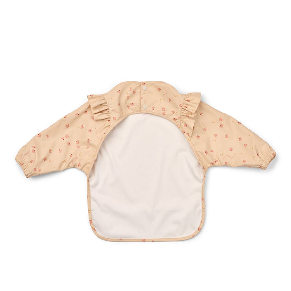 RUFFLED BIB WITH SLEEVES