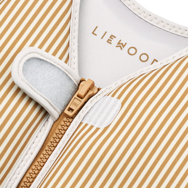 Colete de natação para bebé para ou criança para o verão da liewood na cor STRIPE SANDY GOLDEN CARAMEL