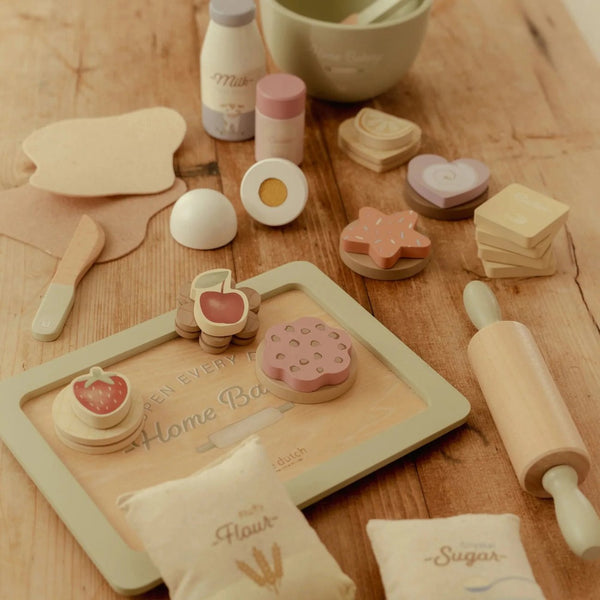 Conjunto de Pasteleiro em madeira com ingredientes, utensílios e bolachas para decorar, ideal para estimular a criatividade e o jogo simbólico das crianças.