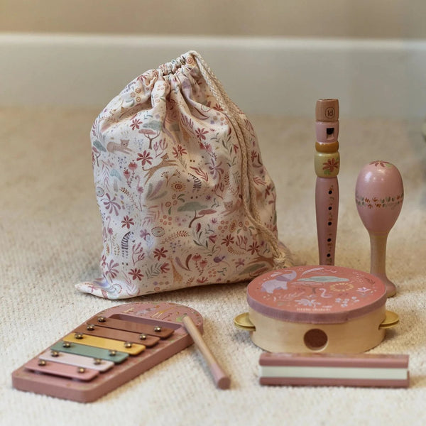 Conjunto Musical Safari Friends com cinco instrumentos infantis e bolsa de arrumação, ideal para desenvolver o ritmo, a criatividade e a coordenação motora das crianças rosa.