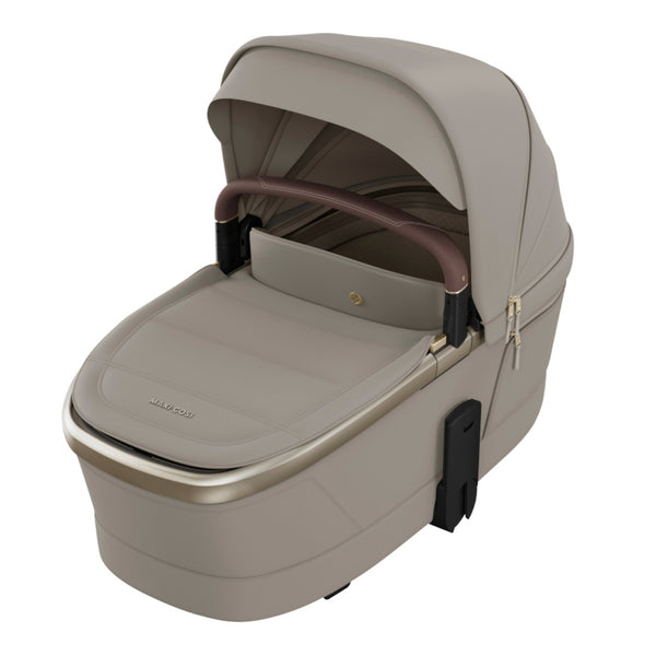 MAXI-COSI Alcofa Fame com tecnologia SoothingSlope, altura ajustável em três níveis, colchão de dupla face, capota extensível, ventilação integrada e acabamentos premium em EcoPele para bebés até aos 9 kg. Sapphire Sand