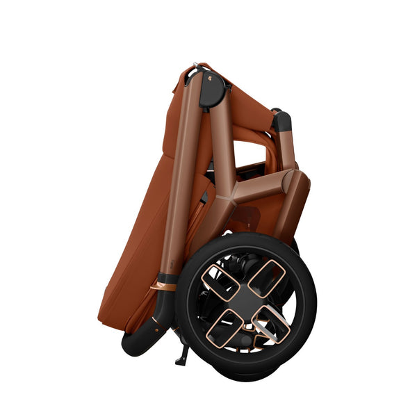 Carrinho Maxi-Cosi Fame com assento reclinável, sistema LumiRide LED, suspensão CosiCruise, apoio de braços e compatibilidade com cadeiras auto SlideTech® copper terra