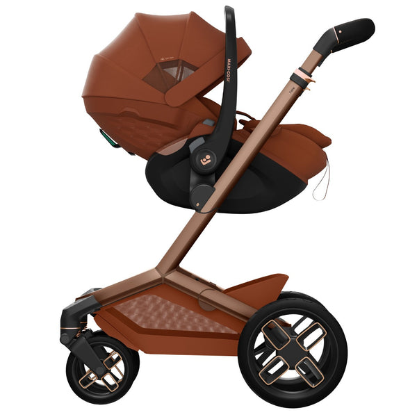 Carrinho Maxi-Cosi Fame com assento reclinável, sistema LumiRide LED, suspensão CosiCruise, apoio de braços e compatibilidade com cadeiras auto SlideTech® copper terra