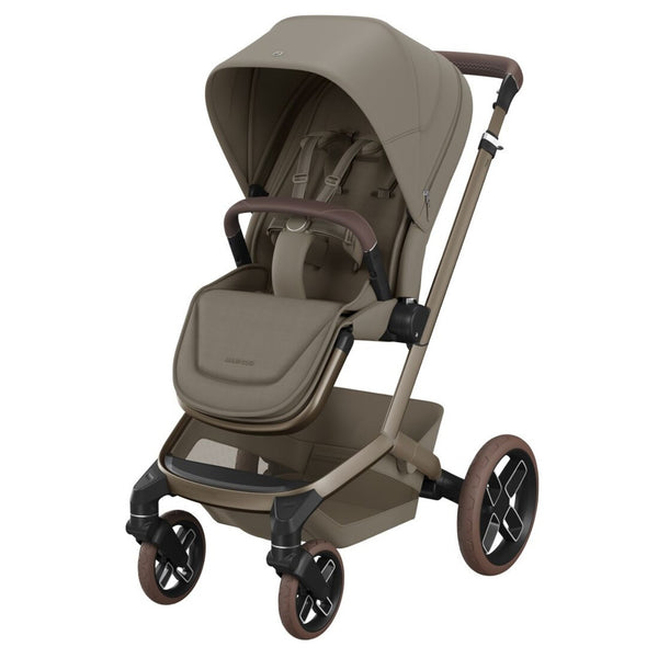 Carrinho Maxi-Cosi Fame com assento reclinável, sistema LumiRide LED, suspensão CosiCruise, apoio de braços e compatibilidade com cadeiras auto SlideTech® oak truffle