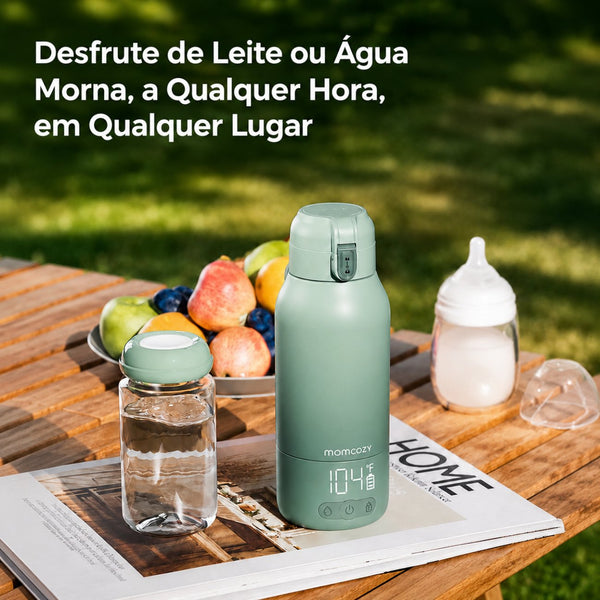 Aquecedor Portátil de Leite e Água Momcozy com controlo preciso de temperatura, aquecimento rápido e design compacto, ideal para viagens e alimentação do bebé fora de casa. Verde