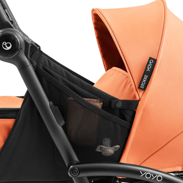 Ninho Stokke YOYO⁵ para recém-nascidos com posição totalmente deitada, arnês de segurança de 5 pontos, janelas de ventilação e dobragem ultracompacta.
Peach