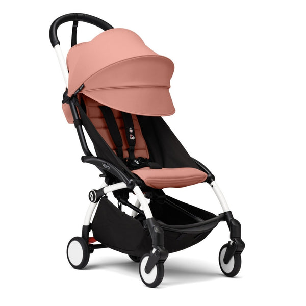 Carrinho Stokke YOYO³ compacto e ultraleve ideal para viagens e cabine de avião estrutura preta cor ginger