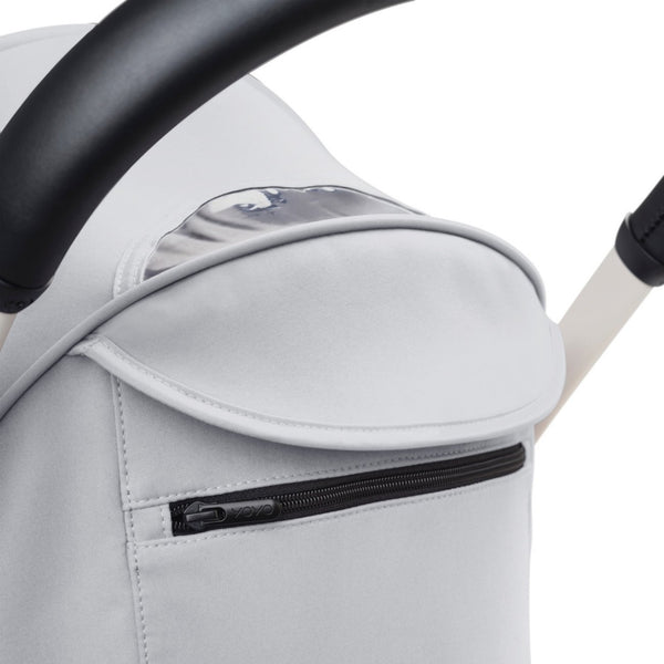 Carrinho Stokke YOYO³ compacto e ultraleve ideal para viagens e cabine de avião estrutura preta cor stone