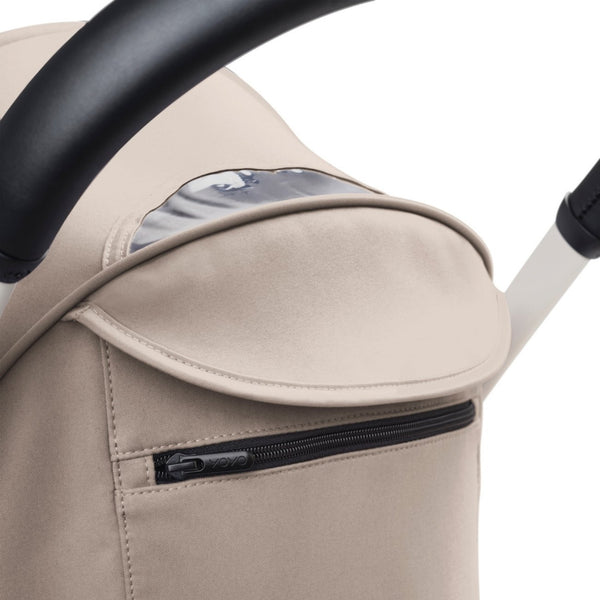 Carrinho Stokke YOYO³ compacto e ultraleve ideal para viagens e cabine de avião estrutura preta cor taupe