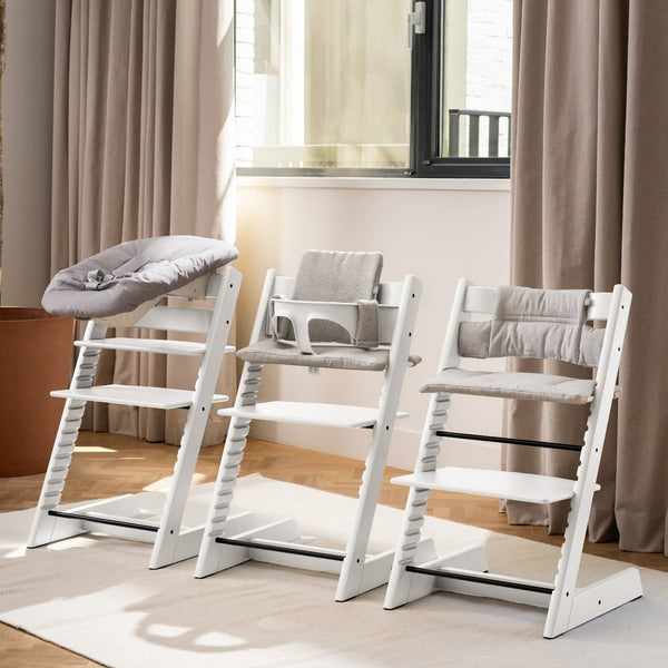 Cadeira Tripp Trapp® com Baby Set² e Newborn Set da Stokke®, solução evolutiva desde o nascimento que acompanha o crescimento da criança até à infância. Beech White