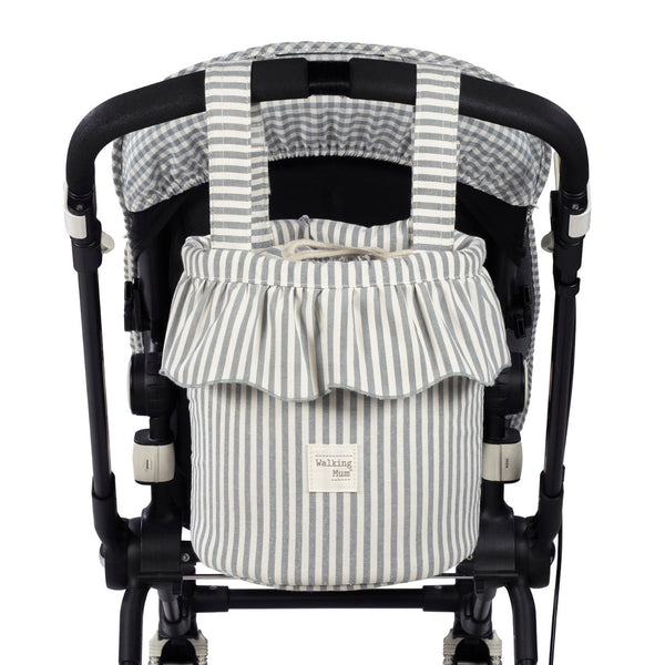 Mala Bucket Praliné Stripes Walking Mum resistente à água com fixação ao carrinho, ideal para transportar os essenciais do bebé durante os passeios. Verde