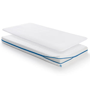 Colchão AeroSleep Evolution 70 × 140 cm com núcleo de espuma híbrida firme e resguardo impermeável respirável 3D incluído para berço de bebé.