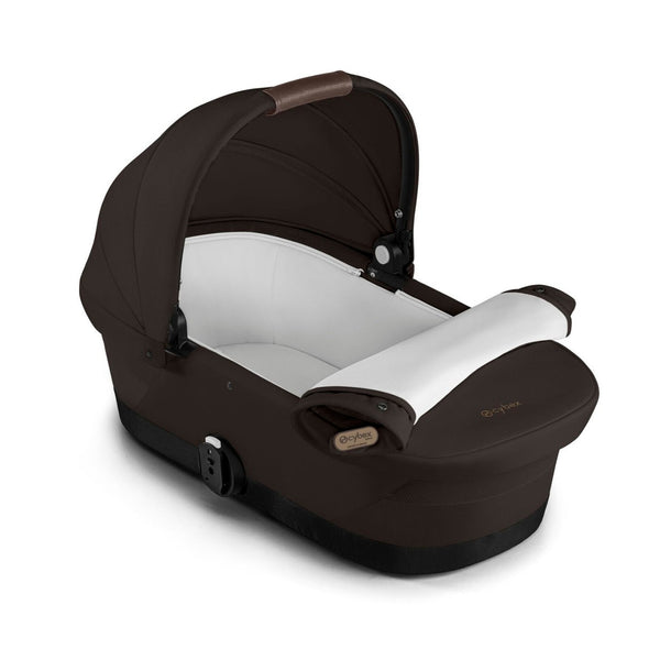 Alcofa CYBEX GAZELLE S compatível com os carrinhos Gazelle S e e-Gazelle S, com colchão em espuma macia, interior espaçoso, pega de transporte e capota solar XXL com proteção UPF 50+ para bebés desde o nascimento até aos 9 kg. Chocolate Brown
