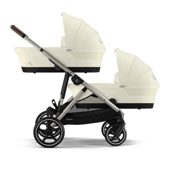 Alcofa CYBEX GAZELLE S compatível com os carrinhos Gazelle S e e-Gazelle S, com colchão em espuma macia, interior espaçoso, pega de transporte e capota solar XXL com proteção UPF 50+ para bebés desde o nascimento até aos 9 kg. Seashell Beige