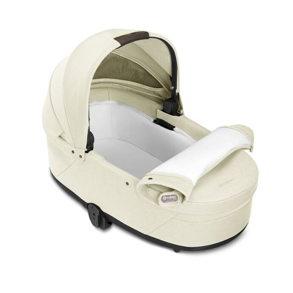 Alcofa CYBEX S LUX compatível com os carrinhos Balios S Lux e Talos S Lux, com colchão em espuma macia, capota solar XXL UPF 50+, ventilação integrada e pega de transporte para bebés desde o nascimento até aos 9 kg. Seahsell Beige