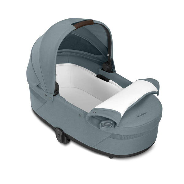 Alcofa CYBEX S LUX compatível com os carrinhos Balios S Lux e Talos S Lux, com colchão em espuma macia, capota solar XXL UPF 50+, ventilação integrada e pega de transporte para bebés desde o nascimento até aos 9 kg. Stormy Blue