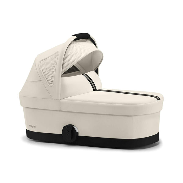 Alcofa CYBEX S compatível com os carrinhos Eezy S, Balios S Lux, Talos S Lux e Avi Spin, com colchão em espuma macia, capota extensível com proteção UPF 50+, ventilação integrada e pega de transporte para bebés desde o nascimento até aos 9 kg. Seashell Beige