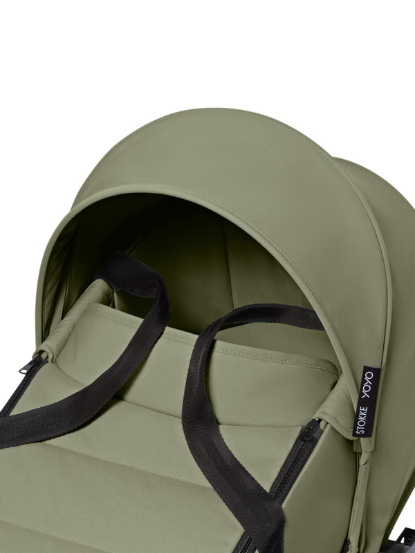 Alcofa STOKKE YOYO³ ultra leve e compacta, com colchão respirável, capota ventilada, cobre-pés, tecido impermeável com proteção UPF 50+ e compatível com o carrinho STOKKE YOYO³ para bebés desde o nascimento até aos 9 kg. Olive