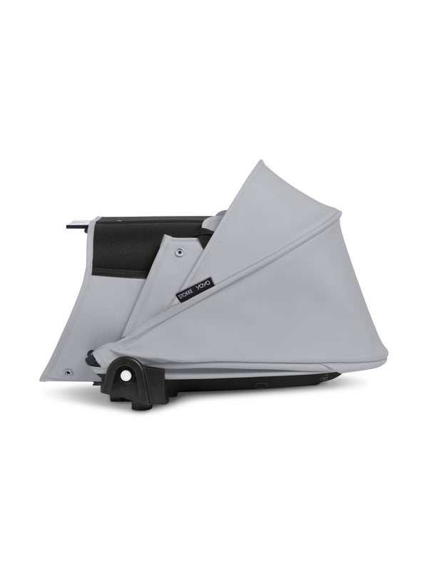 Alcofa STOKKE YOYO³ ultra leve e compacta, com colchão respirável, capota ventilada, cobre-pés, tecido impermeável com proteção UPF 50+ e compatível com o carrinho STOKKE YOYO³ para bebés desde o nascimento até aos 9 kg. Stone
