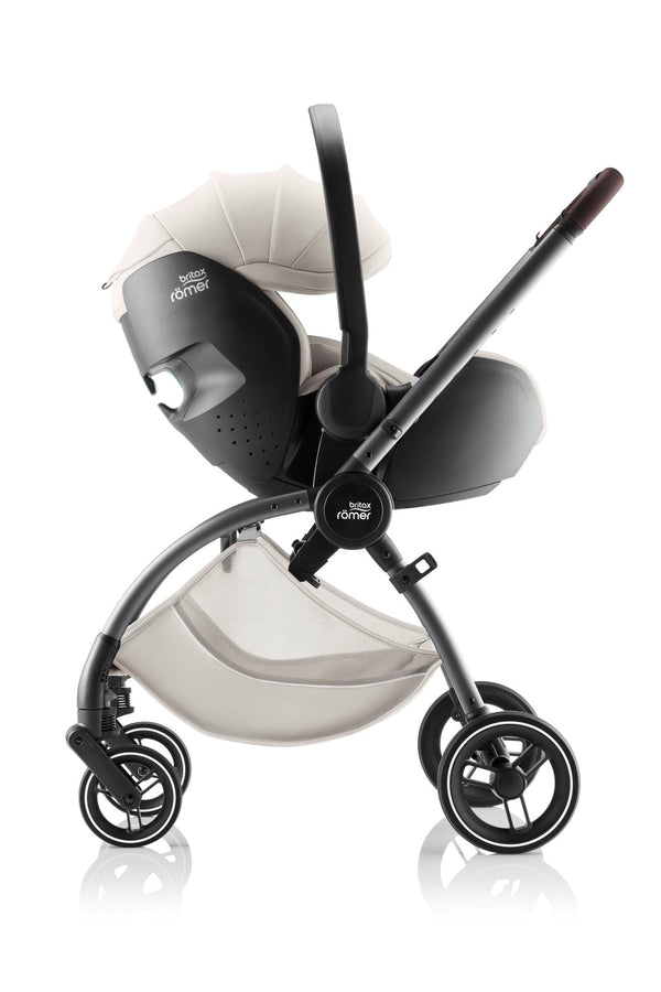 BRITAX RÖMER RIO LUX + OVO com carrinho leve e compacto Rio Lux, cadeira auto Baby-Safe Pro com tecnologia Ergo Recline e adaptadores incluídos. Sistema de viagem confortável e seguro desde o nascimento até aos 22 kg. Soft Taupe