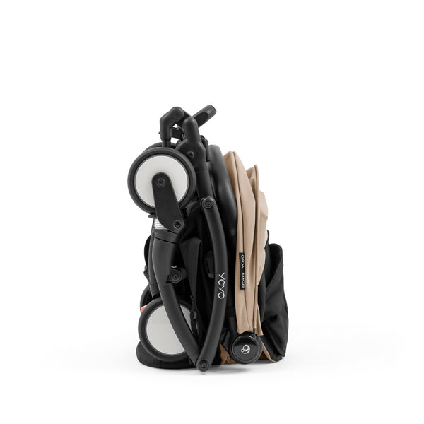 Carrinho Stokke® YOYO⁵ leve e ultracompacto com dobragem a uma mão e suspensão nas 4 rodas
Taupe