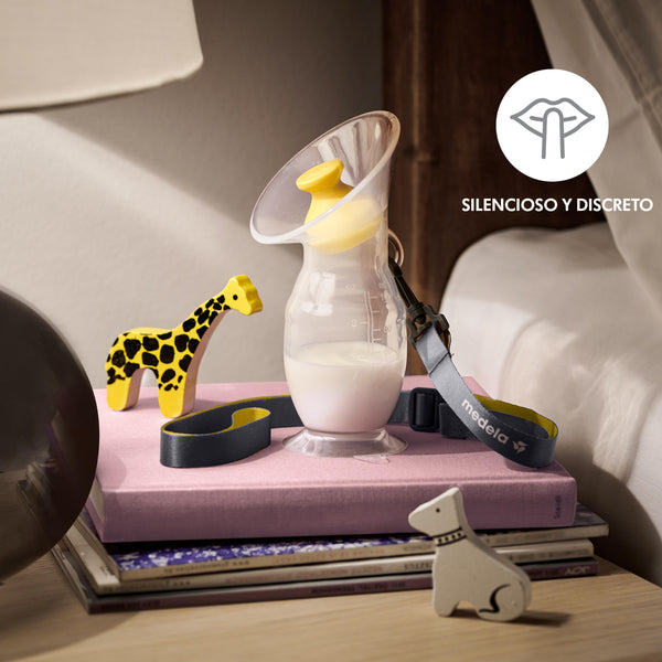 Coletor de leite materno medela em secretária