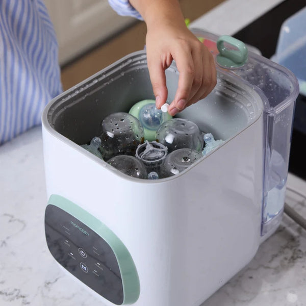 Detergente para Máquina de Lavar Biberões Momcozy com 120 pastilhas efervescentes para KleanPal Pro, ideal para limpar biberões, tetinas e acessórios de alimentação.
