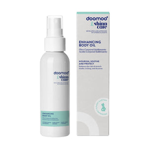 Óleo Corporal Antiestrias Doomoo x Shinncare com 23 ingredientes naturais, textura seca e rápida absorção para hidratar, melhorar a elasticidade da pele e ajudar a prevenir estrias durante a gravidez e pós-parto.