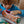 Estojo Individual Hello Hossy em poliéster reciclado, impermeável, com compartimento único espaçoso, fecho resistente e design moderno para material escolar cor music festival