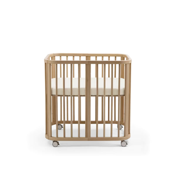 Lençol de baixo Stokke Nighti Mini em percal de algodão 100% orgânico, suave e respirável, para colchão de 60 × 80 cm.
Birch Beige