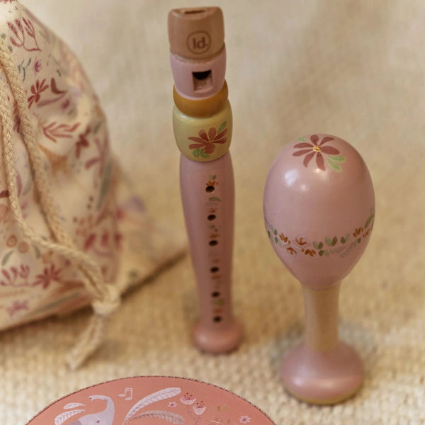Conjunto Musical Safari Friends com cinco instrumentos infantis e bolsa de arrumação, ideal para desenvolver o ritmo, a criatividade e a coordenação motora das crianças rosa.