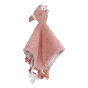 Doudou Flamingo em tecido macio com etiquetas sensoriais e fita para prender chupeta ou mordedor, ideal para confortar e estimular o bebé desde os primeiros meses.