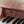 Piano de madeira Safari Friends com 11 teclas e melodias integradas, ideal para estimular a criatividade, o ritmo e a iniciação musical das crianças rosa.