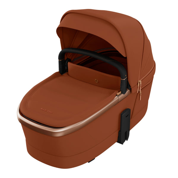 MAXI-COSI Alcofa Fame com tecnologia SoothingSlope, altura ajustável em três níveis, colchão de dupla face, capota extensível, ventilação integrada e acabamentos premium em EcoPele para bebés até aos 9 kg. Copper Terra