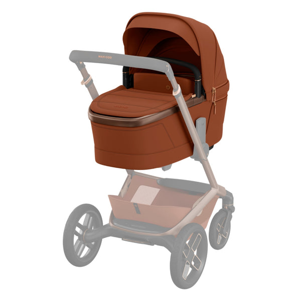 MAXI-COSI Alcofa Fame com tecnologia SoothingSlope, altura ajustável em três níveis, colchão de dupla face, capota extensível, ventilação integrada e acabamentos premium em EcoPele para bebés até aos 9 kg. Copper Terra