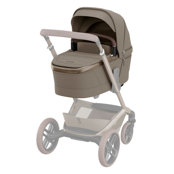 MAXI-COSI Alcofa Fame com tecnologia SoothingSlope, altura ajustável em três níveis, colchão de dupla face, capota extensível, ventilação integrada e acabamentos premium em EcoPele para bebés até aos 9 kg. Oak Truffle