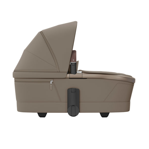 MAXI-COSI Alcofa Fame com tecnologia SoothingSlope, altura ajustável em três níveis, colchão de dupla face, capota extensível, ventilação integrada e acabamentos premium em EcoPele para bebés até aos 9 kg. Oak Truffle