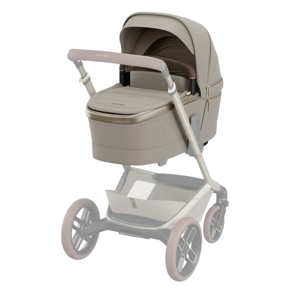 MAXI-COSI Alcofa Fame com tecnologia SoothingSlope, altura ajustável em três níveis, colchão de dupla face, capota extensível, ventilação integrada e acabamentos premium em EcoPele para bebés até aos 9 kg. Sapphire Sand