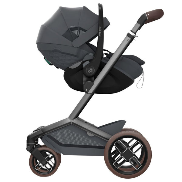 Carrinho Maxi-Cosi Fame com assento reclinável, sistema LumiRide LED, suspensão CosiCruise, apoio de braços e compatibilidade com cadeiras auto SlideTech® moon graphite
