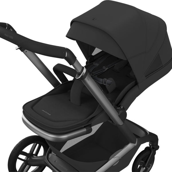 Carrinho Maxi-Cosi Fame com assento reclinável, sistema LumiRide LED, suspensão CosiCruise, apoio de braços e compatibilidade com cadeiras auto SlideTech® onyx black