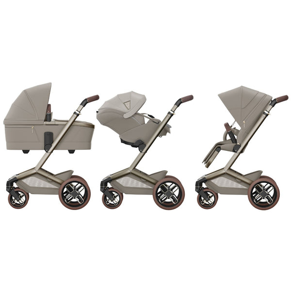 Carrinho Maxi-Cosi Fame com assento reclinável, sistema LumiRide LED, suspensão CosiCruise, apoio de braços e compatibilidade com cadeiras auto SlideTech® saphire sand
