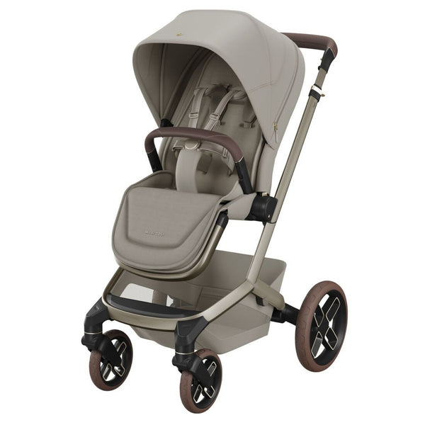 Carrinho Maxi-Cosi Fame com assento reclinável, sistema LumiRide LED, suspensão CosiCruise, apoio de braços e compatibilidade com cadeiras auto SlideTech® saphire sand