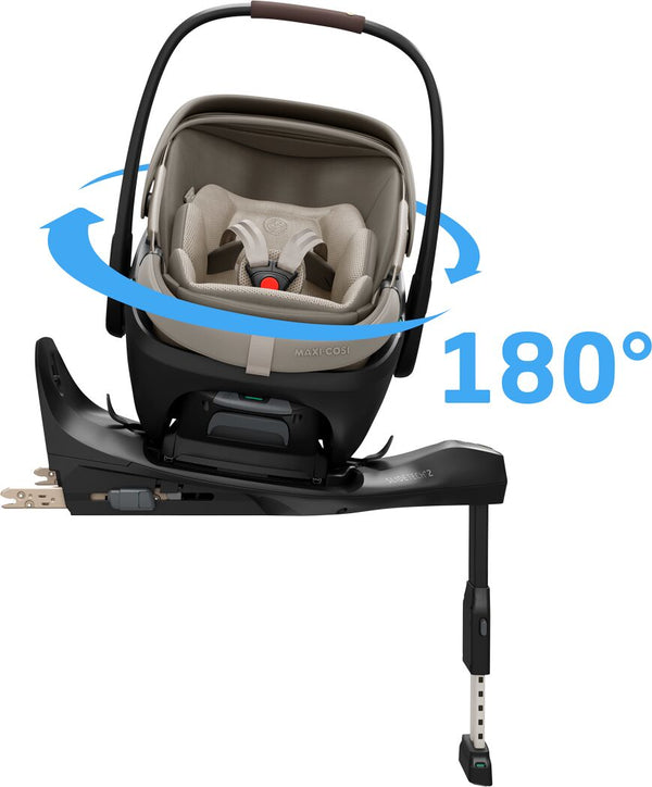 Cadeira auto MAXI-COSI Coral Slide Pro i-Size ultraleve com apenas 2,5 kg, posição totalmente reclinada, três níveis de reclinação, capota extragrande, tecidos ECO Care e compatível com a Base FamilyFix Slide Pro para bebés dos 0 aos 13 kg. Sapphire Sand