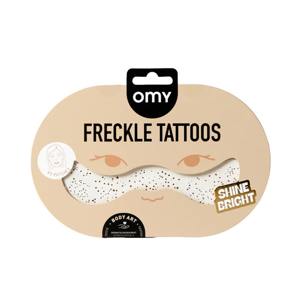 Freckle Tattoos com sardas prateadas temporárias, resistentes à água e dermatologicamente testadas, para um efeito luminoso e brilhante no rosto. Shine Bright