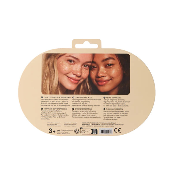 Freckle Tattoos com sardas prateadas temporárias, resistentes à água e dermatologicamente testadas, para um efeito luminoso e brilhante no rosto. Shine Bright